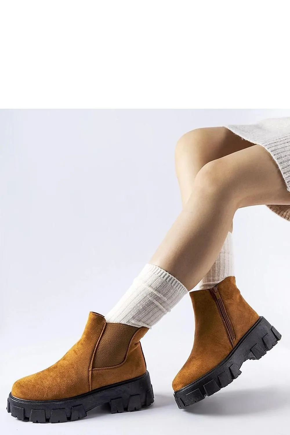 Brown low shoes with a massive sole